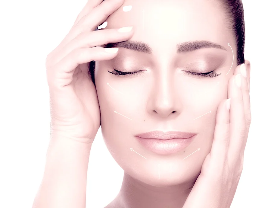 A woman's face marked with the contour lines used to plan dermal filler treatment
